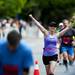 A Dexter-Ann Arbor runner cross the finish line on Sunday, June 2. Daniel Brenner I AnnArbor.com